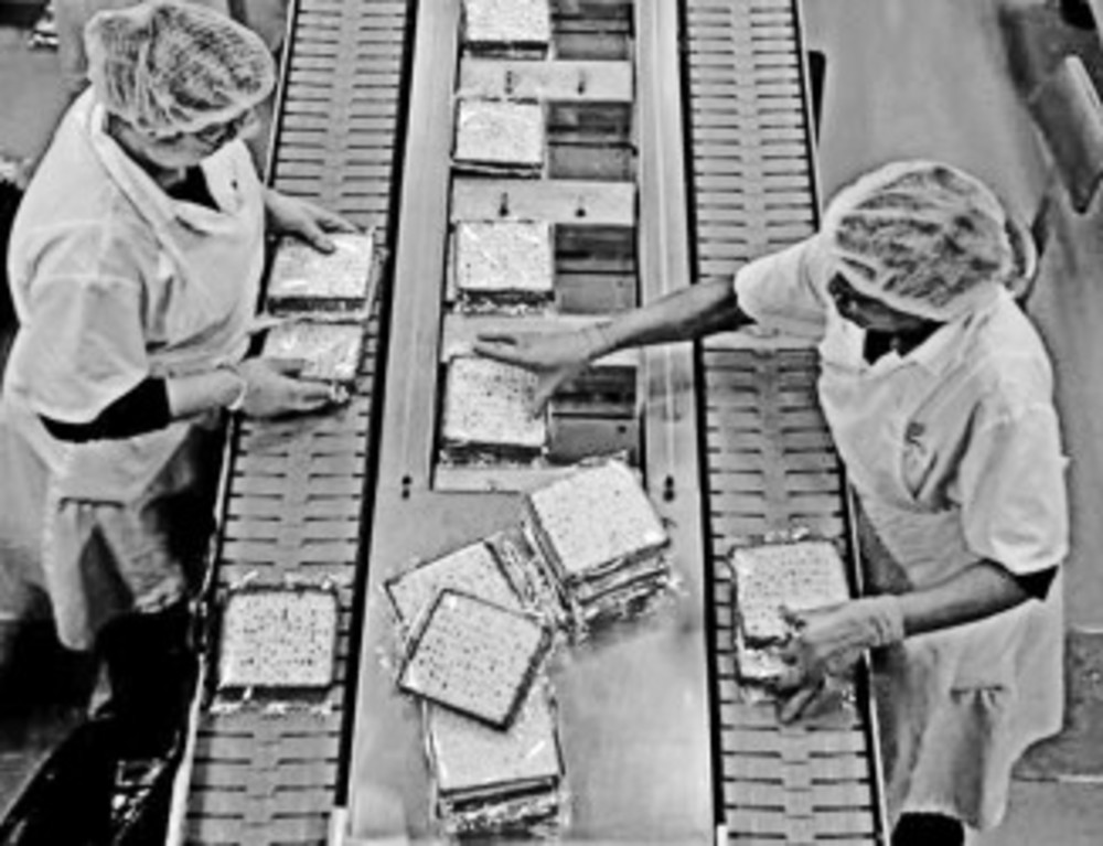 Fresh matzos are packaged on the production line at the Manischewitz manufacturing facility in Newark, N.J. Under strict rabbinical supervision at all times – over 1 million sheets of matzo are produced daily during Passover season.